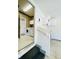 Convenient laundry room is located off the garage with modern washer and dryer at 3926 Castle Rock Dr, Zionsville, IN 46077
