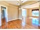 Bright and open living room featuring gleaming hardwood floors and neutral paint at 3926 Castle Rock Dr, Zionsville, IN 46077