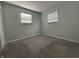Bright bedroom with neutral carpet and dual windows at 4121 Fletcher Ave, Indianapolis, IN 46203