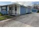 Attractive single Gathering home featuring a detached garage and spacious gravel driveway at 4121 Fletcher Ave, Indianapolis, IN 46203