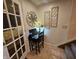 Functional office nook with a small desk, perfect for a home office, beside access to another room at 4808 N Camelot Dr, Muncie, IN 47304