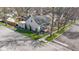 Property showcasing lush landscaping, an inviting front porch, and a well-maintained exterior at 490 W Walnut St, Zionsville, IN 46077