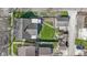 Overhead view of a house with a well-maintained lawn, a detached garage, and a charming ' Shed' at 490 W Walnut St, Zionsville, IN 46077