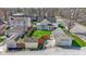 Aerial shot of a home's backyard featuring a ' Shed' with a pergola and a detached garage at 490 W Walnut St, Zionsville, IN 46077