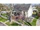 Lovely home showing a beautifully maintained lawn, landscaping, and inviting front porch at 490 W Walnut St, Zionsville, IN 46077