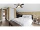 Bedroom featuring a bed, neutral decor, and a ceiling fan at 490 W Walnut St, Zionsville, IN 46077