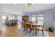 Open concept, featuring a dining room, kitchen, and access to the backyard at 490 W Walnut St, Zionsville, IN 46077