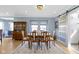Traditional dining room boasts a wooden table, chairs, and a decorative hutch at 490 W Walnut St, Zionsville, IN 46077