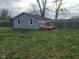 Spacious backyard features a wooden deck and is enclosed by a wooden fence at 509 N Home Ave, Mooresville, IN 46158