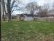 Charming single-story home with a covered porch and a large grassy front yard at 509 N Home Ave, Mooresville, IN 46158