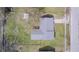 An aerial view of a well-maintained home featuring a gray roof and lush green lawn at 6124 Dry Den Ct, Indianapolis, IN 46221