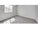 Neutral bedroom with carpet, AC, and window at 6124 Dry Den Ct, Indianapolis, IN 46221