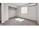 Bedroom featuring neutral walls, carpeted floors, AC, and a window providing natural light at 6124 Dry Den Ct, Indianapolis, IN 46221