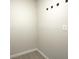 Empty closet features painted walls, new vinyl floors, and a convenient layout at 6124 Dry Den Ct, Indianapolis, IN 46221