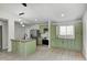Beautifully renovated kitchen with green cabinets and stainless steel appliances at 6124 Dry Den Ct, Indianapolis, IN 46221
