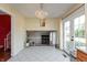 Open concept dining area with view of the lower level and outdoor access at 6340 Bluebell Ct, Indianapolis, IN 46224