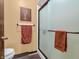 This bathroom features a tiled shower, a toilet, and complementary towels at 641 Beech W Dr, Plainfield, IN 46168