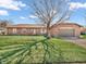 Charming single-story brick home with a well-maintained lawn and attached garage at 641 Beech W Dr, Plainfield, IN 46168