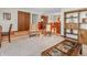 Spacious living room with a blend of carpeted and hardwood flooring, plus ample seating at 641 Beech W Dr, Plainfield, IN 46168