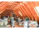 Unfinished attic space with exposed rafters and storage bins at 649 E Country Ln, Martinsville, IN 46151