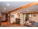 Spacious basement with a kitchenette area, stairs, and comfortable seating at 649 E Country Ln, Martinsville, IN 46151