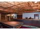 Finished basement with pool table and rustic wooden accents at 649 E Country Ln, Martinsville, IN 46151