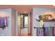 Basement hallway with shelving and access to backyard at 649 E Country Ln, Martinsville, IN 46151