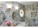 Bathroom featuring attractive tile work, vanity, and a decorative window at 649 E Country Ln, Martinsville, IN 46151