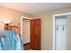 Bedroom featuring wood accents and an open closet at 649 E Country Ln, Martinsville, IN 46151