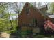 Brick house with a patio and lots of trees at 649 E Country Ln, Martinsville, IN 46151