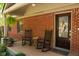 Charming front porch with rocking chairs at 649 E Country Ln, Martinsville, IN 46151