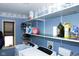 Well-organized laundry room with shelving, and washer/dryer, offering convenience and storage at 649 E Country Ln, Martinsville, IN 46151