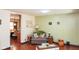 Comfortable living room with view into dining area at 649 E Country Ln, Martinsville, IN 46151