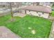 Expansive backyard featuring well-maintained lawn and a quaint patio area for outdoor gatherings at 66 Coronado Rd, Indianapolis, IN 46234