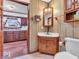 Bathroom featuring a corner sink and vanity area with views into the kitchen at 66 Coronado Rd, Indianapolis, IN 46234