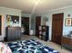 Large bedroom with a blue quilt, closet and ensuite bathroom at 7211 Kensington Ct, Avon, IN 46123