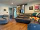 Comfortable living room with stylish seating, hardwood floors, and attractive decor elements throughout at 7211 Kensington Ct, Avon, IN 46123