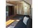 Recreation room with a climbing wall, climbing apparatus, seating area, and hardwood floors at 7211 Kensington Ct, Avon, IN 46123
