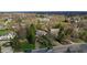 Expansive aerial view of a neighborhood featuring mature trees and well-maintained homes on spacious lots at 7525 N Meridian St, Indianapolis, IN 46260