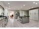 Spacious kitchen with stainless steel appliances, a central island, and custom cabinetry at 7525 N Meridian St, Indianapolis, IN 46260