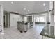 Expansive kitchen featuring a granite island, modern appliances, and ample cabinet space at 7525 N Meridian St, Indianapolis, IN 46260