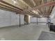 Unfinished basement featuring concrete floors, sealed walls, lighting and roughed-in stairs to upper level at 7730 Imperial Eagle Dr, Zionsville, IN 46077