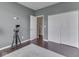Spare bedroom with gray walls, minimal furniture, and hardwood floors at 7730 Imperial Eagle Dr, Zionsville, IN 46077