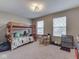 Cozy bedroom offering a bunk bed, natural light, and playful decor at 7730 Imperial Eagle Dr, Zionsville, IN 46077
