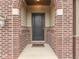 Front door with brick and siding entryway at 7730 Imperial Eagle Dr, Zionsville, IN 46077