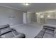 Open living room featuring neutral paint, carpeting, and comfortable seating arrangement at 7730 Imperial Eagle Dr, Zionsville, IN 46077