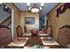 Elegant dining room featuring a chandelier and a table set for a formal meal at 8358 Balmoral Dr, Avon, IN 46123