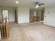 Large landing on the second floor with soft carpet and wood trim at 8358 Balmoral Dr, Avon, IN 46123