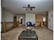 Upstairs living area with cozy seating, wood railings, and ample natural light at 8358 Balmoral Dr, Avon, IN 46123