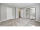 Bedroom featuring neutral tones, carpet, and a sliding mirror door closet at 901 W 250 N, Lebanon, IN 46052